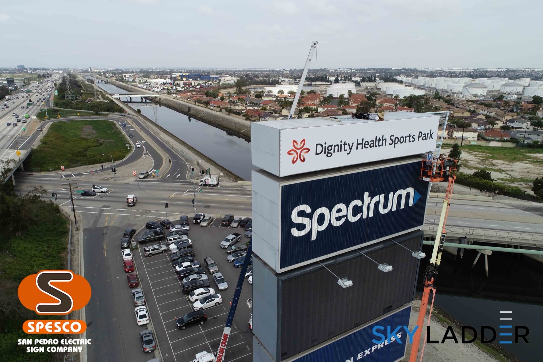 Dignity Health Sports Park freeway sign on the 405 in Carson under a clear sky