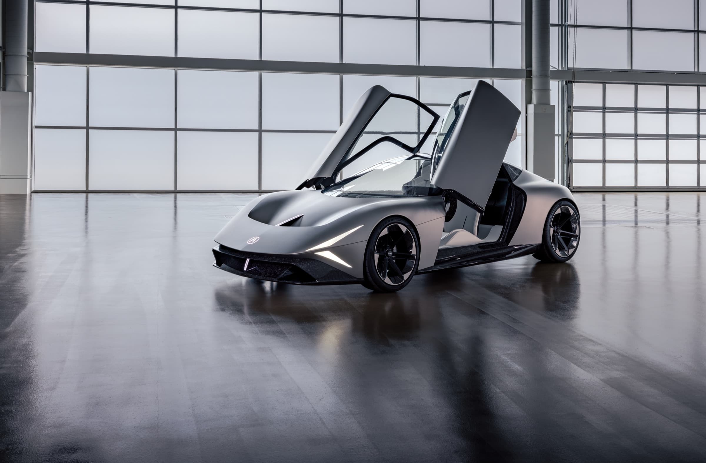 Matte Titanium Acura NEXERA Vision coupe concept with butterfly doors open, showing ultra-thin headlight signature