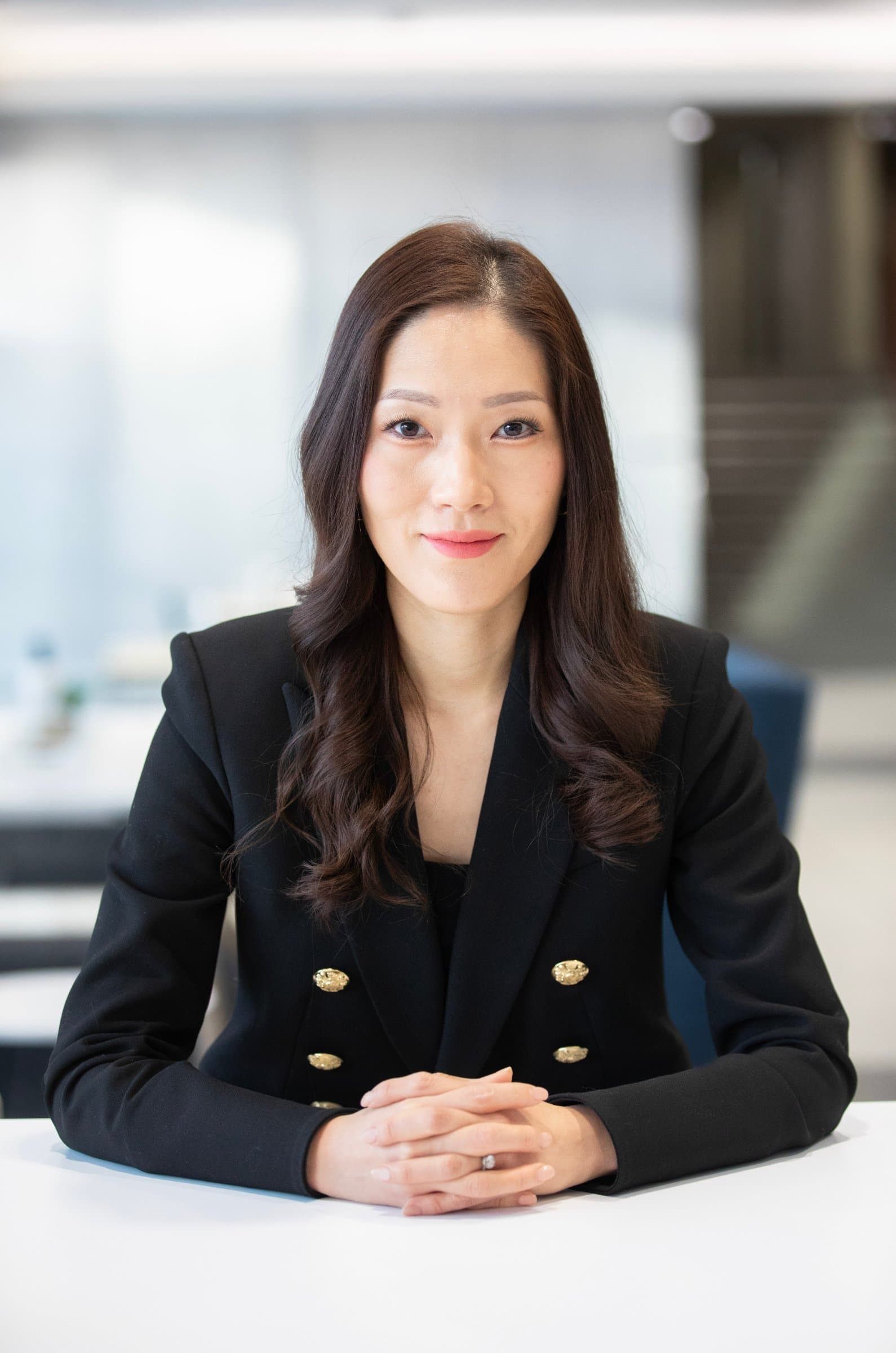 Christine Park Cheng, Lincoln global design director, seated in a black blazer