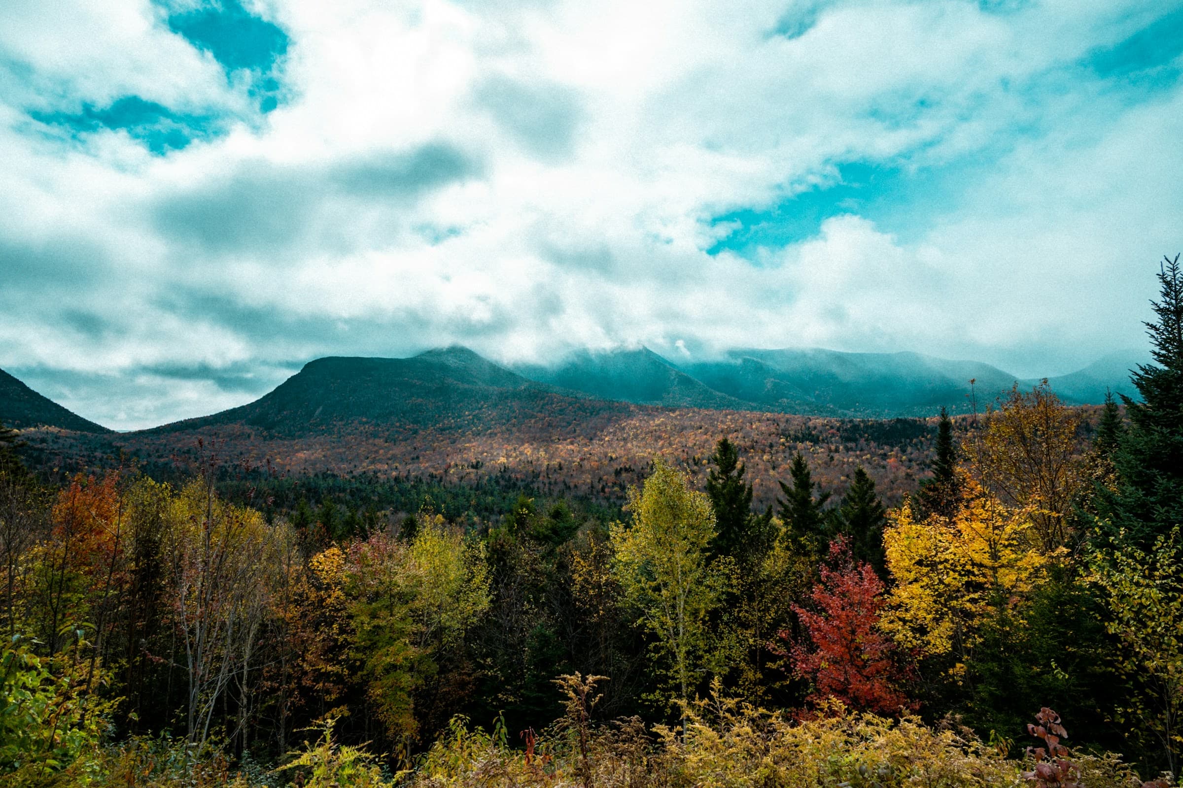 Autumn forest and mountain ridges along the Kancamagus Highway in New Hampshire