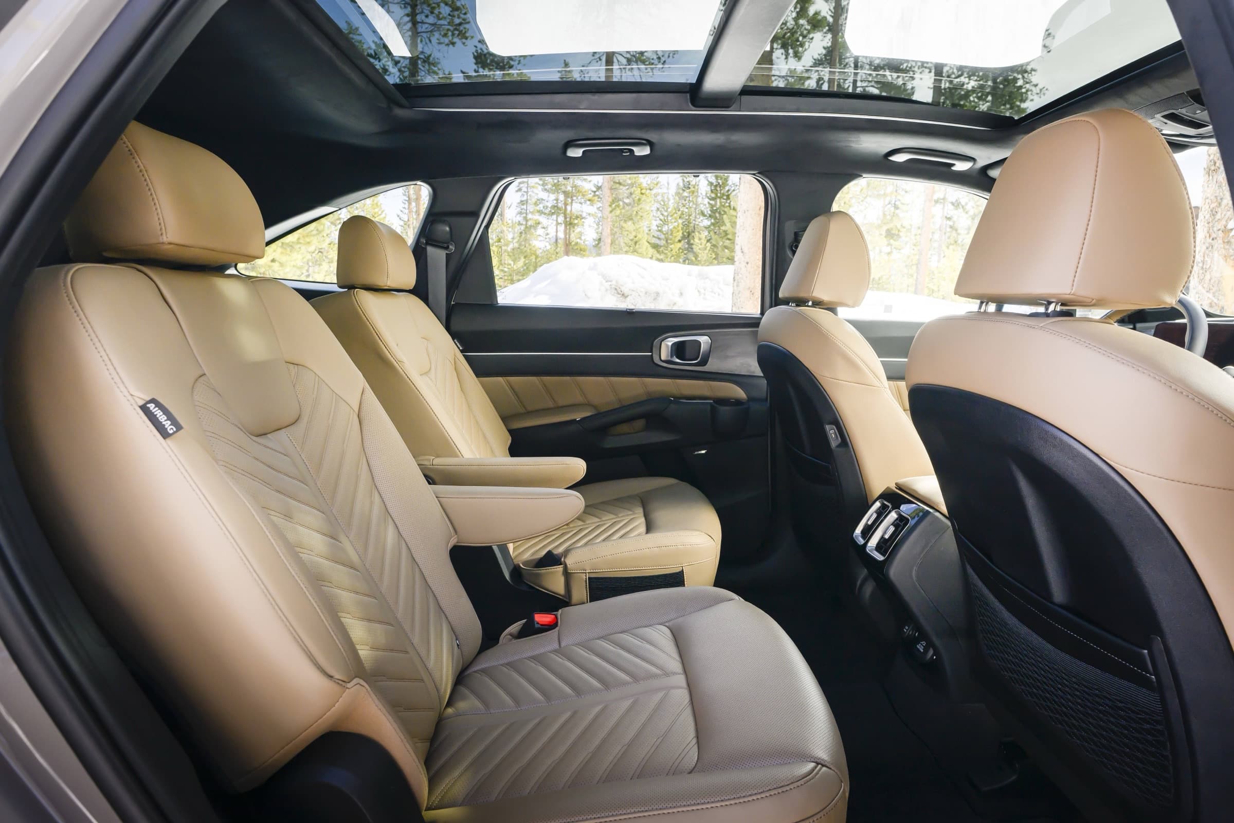 2026 Kia Sorento second-row captain’s chairs with quilted tan upholstery and a panoramic sunroof