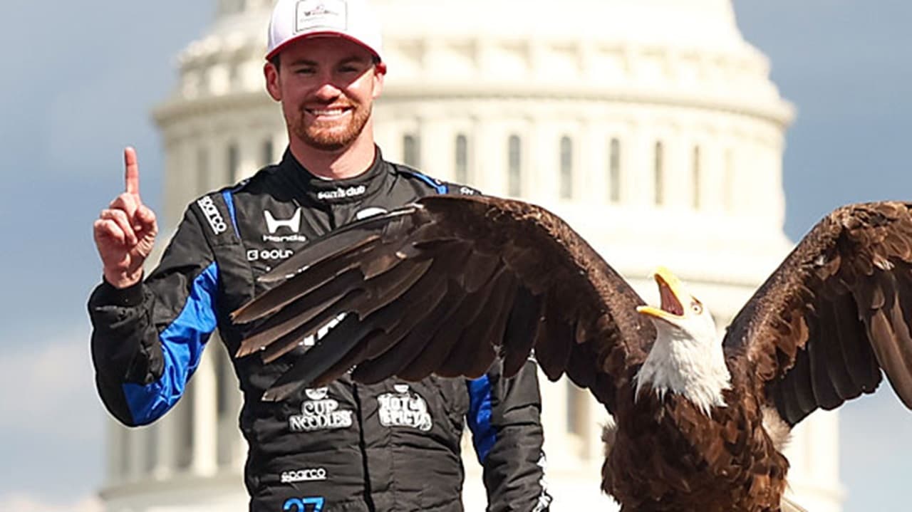 Kyle Kirkwood celebrates winning the Freedom 250 Grand Prix on the streets of Washington, D.C.