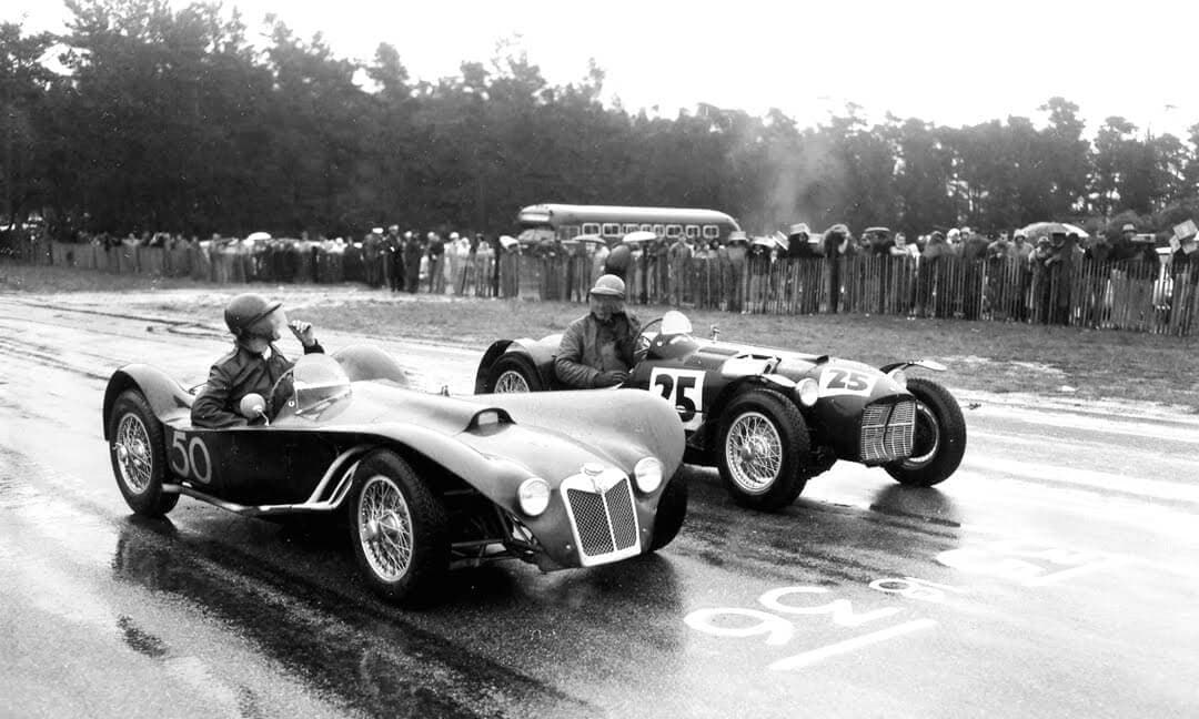 Ken Miles in the low MG R2 Flying Shingle beside MG R1 at the start of the 1955 Pebble Beach Cup
