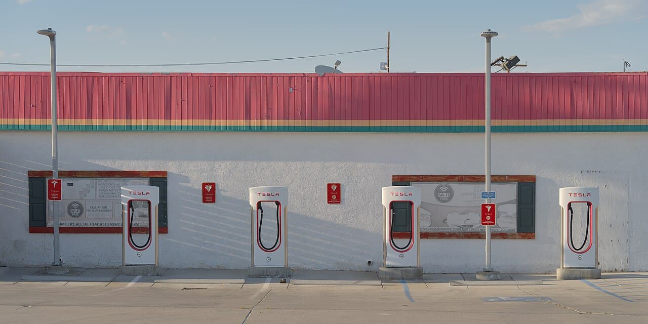 DC fast-charging stalls at a highway charging hub