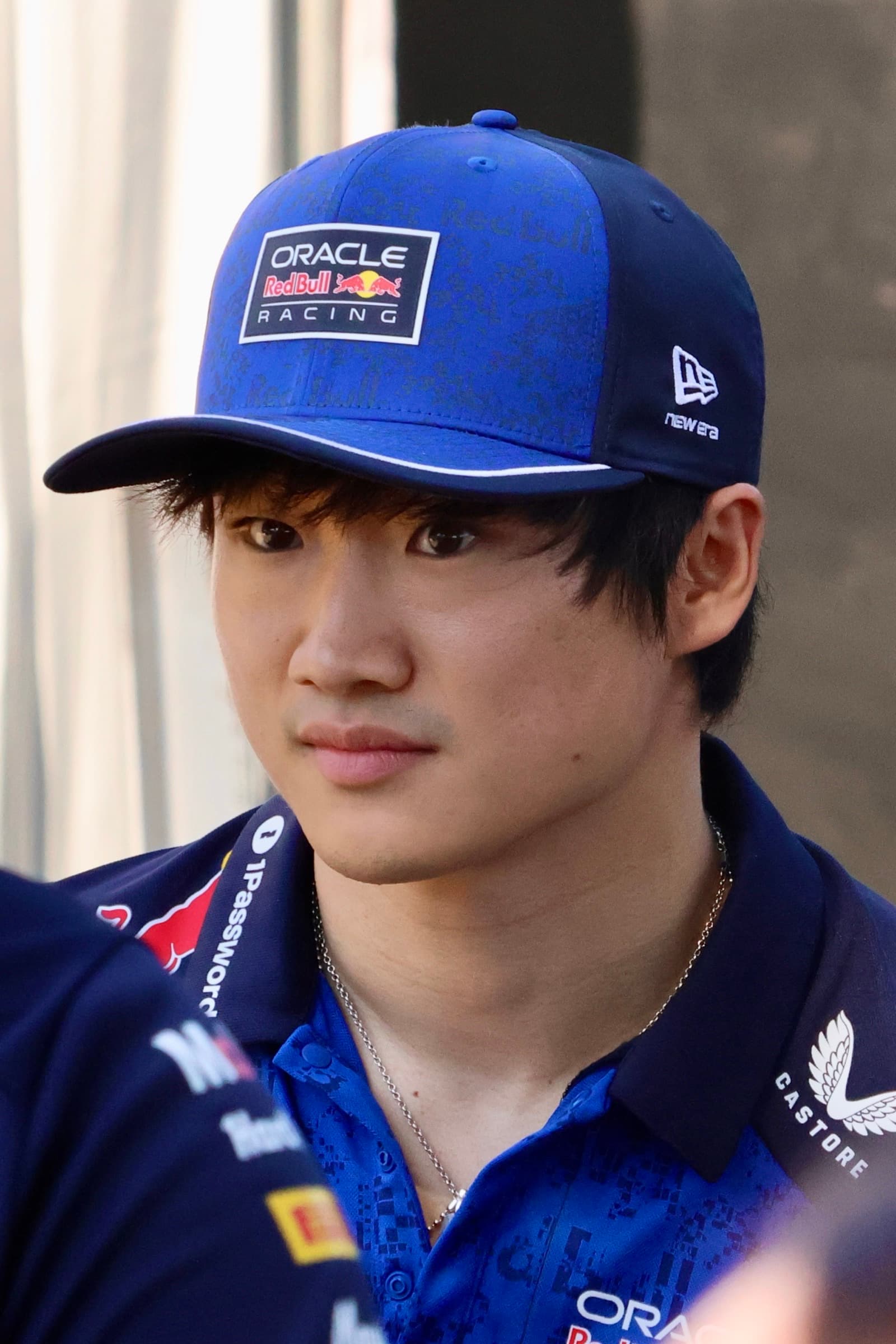Yuki Tsunoda in a Red Bull racing cap and polo at the 2026 Australian Grand Prix Melbourne Walk