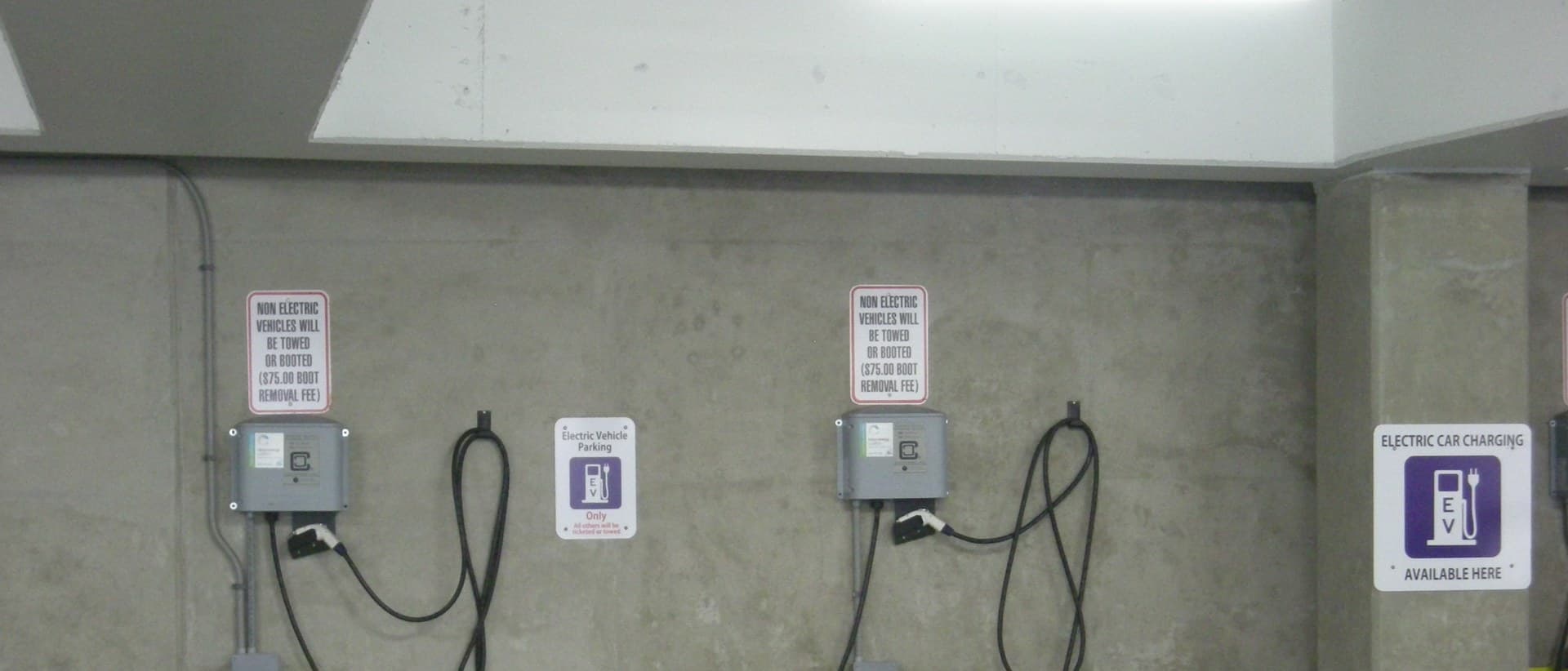 Level 2 EV charging stations in a multi-story parking garage