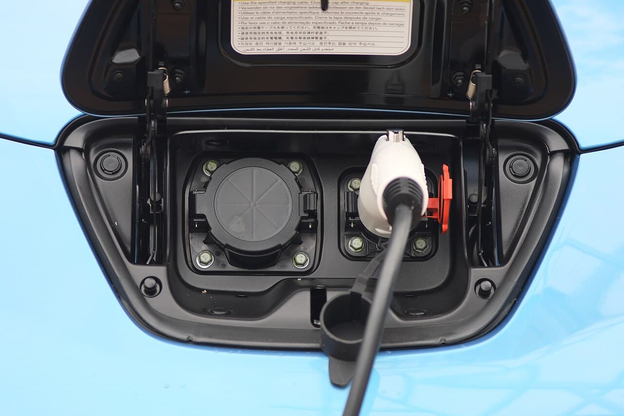 Nissan Leaf plugged into a Level 2 charging unit