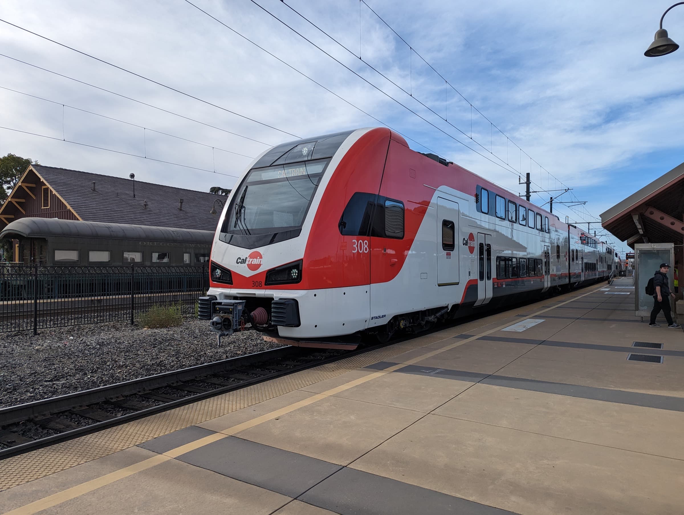Caltrain Stadler KISS electric train passing Santa Clara station
