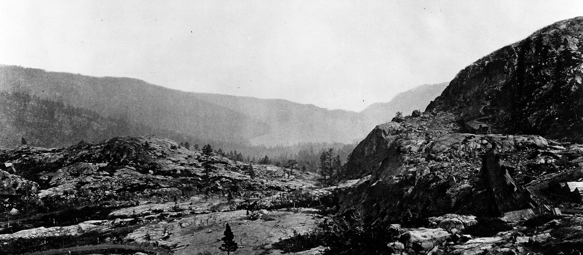 Snow-covered Sierra Nevada terrain along the I-80 corridor near Donner Pass