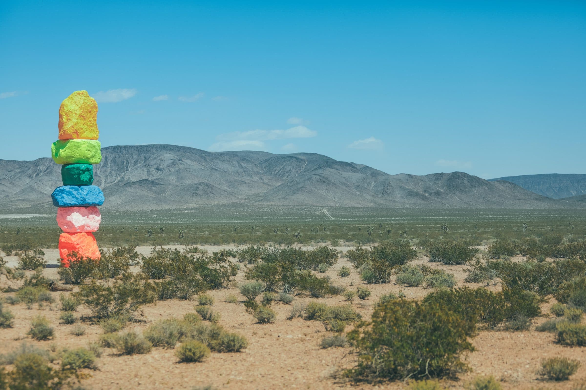 Neon-painted boulder tower from Seven Magic Mountains in the Mojave Desert south of Las Vegas