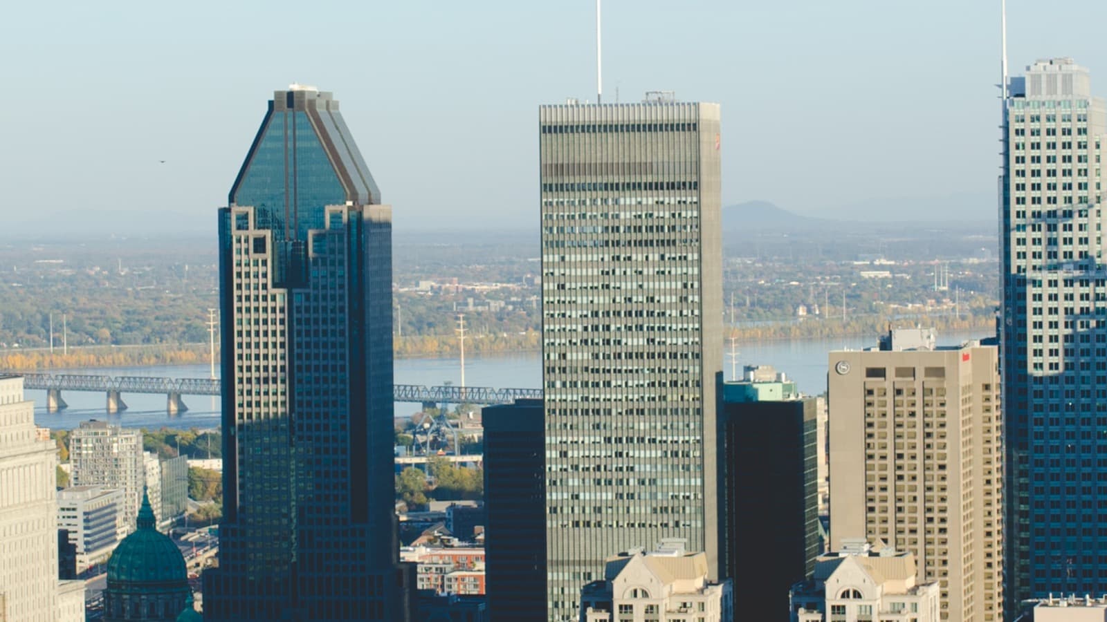 Downtown Montreal skyline at dusk from the Old Port